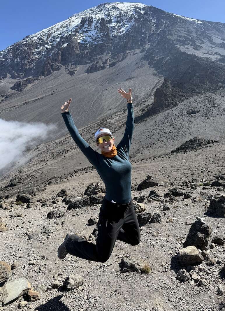 A female leader climbing Mount Kilimanjaro